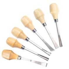 six wood carving tools with wooden handles