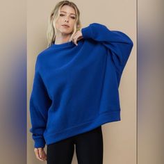 Round Neck, Oversized Sweatshirt With Dropped Shoulder. Amazingly Soft And Feels So Good! 50% Cotton, 50% Polyester Model Height: 5’8.5”; Dress Size: 2; Bust: 34”; Waist: 24”; Hips: 34” Blue Crew Neck Sweatshirt For Everyday, Blue Long Sleeve Sweatshirt For Everyday, Oversized Blue Sweatshirt For Winter, Oversized Blue Sweater With Ribbed Cuffs, Blue Drop Shoulder Sweater With Ribbed Cuffs, Blue Relaxed Fit Sweatshirt, Blue Relaxed Fit Sweater For Loungewear, Blue Tops With Ribbed Cuffs And Relaxed Fit, Trendy Blue Drop Shoulder Tops