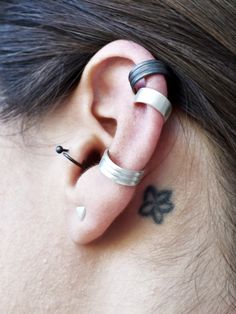 a person with ear piercings on their ears