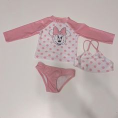 3 Piece Swimsuit Minnie Mouse 12 Mo Washed Never Worn White And Pink Bow On Back Bottoms Cute Swimwear With Character Print For Playwear, Playful White Minnie Mouse Sets, Cute Character Print Swimwear For Playwear, Cute Character Print Swimwear For Playtime, Disney Swimwear For Beach In Summer, White Minnie Mouse Playtime Sets, Disney Swimwear For Summer Beach, Cute Fitted Minnie Mouse Sets, Cute Character Print Swimwear For Play