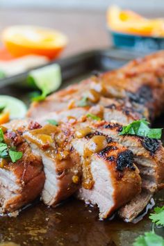 some meat is sitting on a cutting board