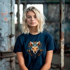 Introducing the "Heart Wolf" Graphic T-Shirt, a stunning blend of artistry and nature. This captivating design features an intricately detailed wolf's face, adorned with elaborate patterns and vibrant hues of blue, orange, and white. The piercing blue eyes of the wolf exude wisdom and mysticism, drawing you into its enigmatic presence. Flowing waves of fur create a dynamic and ethereal effect, enhancing the majestic aura of this powerful creature. Perfect for those who appreciate unique and meaningful artwork, the "Heart Wolf" T-Shirt is a bold statement piece that embodies strength, beauty, and the spirit of the wild. Setting the benchmark for high-quality unisex t-shirts, this design is a cherished classic. Boasting a crew neck and short sleeves, it's expertly crafted from top-tier combe Wolf Design Short Sleeve Tops For Streetwear, Short Sleeve Wolf Design Tops For Streetwear, Short Sleeve Tops With Wolf Design For Streetwear, Wolf Design Graphic Tee For Streetwear, Graphic Tee With Wolf Design For Streetwear, Streetwear Graphic Tee With Wolf Design, Wolf Graphic, Meaningful Artwork, Wolf Face