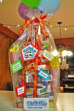 a basket filled with lots of candy and balloons