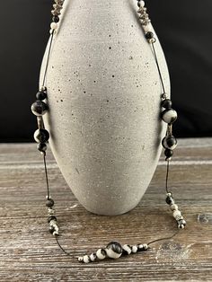 "This is a 30\" zebra stone beaded necklace with silver plated accent beads.  The necklace is strung on durable nylon cord.  It has a sliding closure allowing for up to an additional 4\" of length if desired.  It can be worn as is or with the closure in front, making it \"twice as nice.\" The necklace will arrive ready for gifting." Twice As Nice, Stone Beaded Necklace, White Beads, Beaded Chain, Natural Leather, Chain Styles, Gemstone Necklace, Stone Beads, Fashion Bracelets