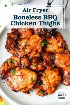 air fryer boneless bbq chicken thighs on a white plate with text overlay