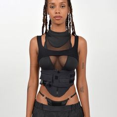 Explore our Women's Tactical Tank Top – a black techwear warcore apparel that seamlessly merges style and functionality. Embrace the urban chic with military-inspired design, making a bold statement in contemporary fashion. Techwear Women, Patchwork Crop Top, Fishnet Top, Black Cropped Tank, Black Crop Top Tank, High Street Fashion, Looks Street Style, Festival Looks, Casual Tops For Women