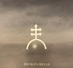 the cover of broken bells'album, with an image of a cross on it