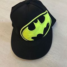 New Without Tags. Batman Hat With Fluorescent Green. Batman Symbol. One Size Fits Most Adjustable On Back. Black Hat, On Back, Black Green, New Color