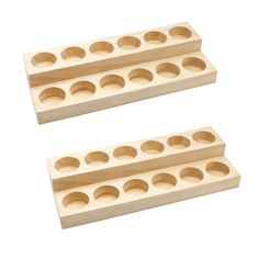 two wooden trays with holes in them