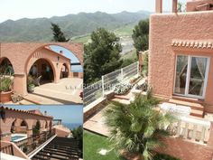 an aerial view of a house with mountains in the background and palm trees on the lawn