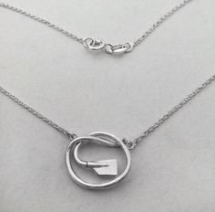 Open Knot Necklace with Petite Rowing Blade Sterling Silver by Rubini Jewelers Knot Necklace, Rowing, Life Size, The Knot, Link Chain, Knot, Silver Necklace, Cable, Sterling Silver