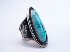 It’s only after you’ve stepped outside your comfort zone that you begin to change, grow, and transform. This piece aims to remind us that we are always ascending, its exquisite artistic detail create a wearable landscape, a harmonious compliment to your day. Ring Size - 9.5 (US) Materials: .925 silver, Natural Nevada Blue Turquoise, Black enamel Timeless Jewelry With Large Stone, Timeless Large Stone Ring Jewelry, Timeless Jewelry Ring With Large Stone, Nature-inspired Oval Rings Untreated, Nature-inspired Untreated Oval Rings, Adjustable Oval Ring, Adjustable Oval Nature-inspired Rings, Oval Sterling Silver Rings With Patina, Unique Oval Ring With Patina