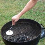 someone is grilling food on the grill with an onion in front of them and text that reads, clean the grill with an onion