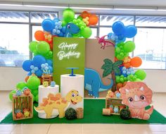 a birthday party with balloons and decorations