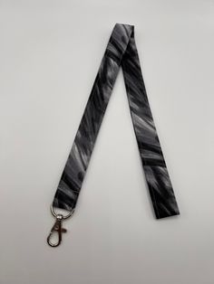 "Black Paint Stroke Lanyards Perfect for wearing your keys around your neck, a cute accessory for your ID badge, and so much more! 4 Combinations to Pick From -Long W/ Swivel Clasp -Long W/ D-Ring -Short W/ Swivel Clasp -Short W/ D-Ring Long: 19\" when laid flat, 36\" circumference of opening  Short: 5\" when laid flat, 9\" circumference of opening  Made with 100% cotton fabric Machine wash on a delicate setting, DO NOT put in dryer  Please feel free to reach out if you have any questions!" Black And White Artist, Key Fob Wristlet, Fabric Lanyard, Paint Strokes, Id Badge Holders, Badge Holder, Id Badge, Badge Holders Lanyard, Badge Holders