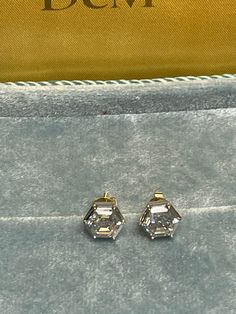 A pair of beautiful Georgian Vcitorian hexagon stud earrings, set with 3 carats (1.5 carat each) of brilliant cut moissanites or diamonds in Georgian cut down collet setting, handcrafted in 18k white gold and 18k yellow gold. Item Details • Made to Order. • Gold Kt: 18K Solid Gold • Custom Gold Color: Rose Gold, Yellow Gold, White Gold • Diamond/Moissanite Cut: Hexagon • Ready to Ship in 15-20 business days If you have any additional questions about these earrings, just hit the "Ask a Question" Elegant Octagon Diamond Earrings With Accents, Elegant Diamond White Octagon Earrings, Elegant Octagon Brilliant Cut Earrings, Formal Octagon Earrings With Diamond Accents, Octagon Earrings With Diamond Accents For Formal Occasions, Octagon-shaped Diamond Earrings For Formal Events, Elegant Octagon Prong Set Diamond Earrings, Elegant Octagon Diamond Earrings With Prong Setting, Octagon Diamond Earrings For Formal Events