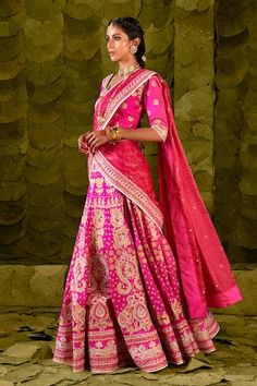 Hot pink lehenga embellished with silk tape, aari gold zari embroidery in paisley pattern, comes with separate cancan. Paired with an embroidered blouse and embroidered dupatta. - Aza Fashions Lehenga Pattern, Pink Lehenga, Paisley Pattern, Bridal Lehenga, Embroidered Blouse, Embroidered Silk, Aza Fashion, Lehenga, Hot Pink