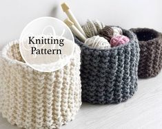 three crocheted baskets with knitting needles in them