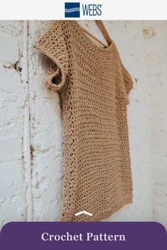 a crochet top hanging on a wall with the words, crochet pattern