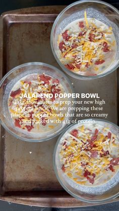 three bowls filled with food sitting on top of a metal baking pan next to each other