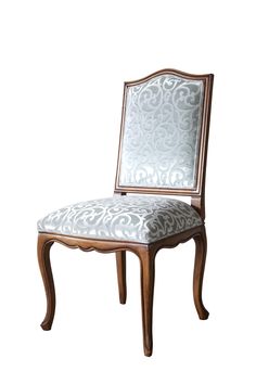 an ornate wooden chair with a mirror on the back and seat cushion in front of it