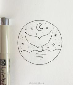 a drawing of a whale's tail in a circle with stars and moon on it