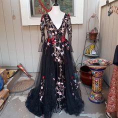 Women's V-Neck Long Straight Dress With Floral Stitching And Tule Overskirt. Overskirt Has Sequins And Floral Apliques. Dress Zips In Back. Long Straight Dress, Pink Mermaid Dress, Red Satin Gown, Mac Duggal Prom Dresses, Floral Stitching, Sequin Ball Gown, Long Mermaid Dress, Mac Duggal Dress, One Shoulder Prom Dress