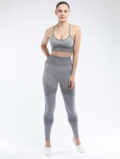 DescriptionMaterial:Polyester. spandex. High stretch. seamless. breathable. moisture-wicking. non-shrink.Feature: High elastic sports bra and sports leggings provide your breast and hip good support.Occasion: Great workout sets for yoga. sports. fitness. exercise. running.Size Chart: Gray Seamless Sporty Leggings, Solid Color Compression Sports Bra In Seamless Fabric, Breathable High Stretch Seamless Sports Bra, Gray Seamless Workout Leggings, Gray Workout Leggings With Seamless Construction, High Stretch Seamless Gym Leggings, Gray Breathable High Stretch Activewear, Seamless Athleisure Activewear Without Elasticity, Breathable Gray Yoga Pants For Sports