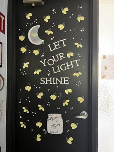 a door with the words let your light shine written on it and butterflies all over