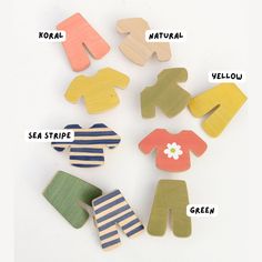 wooden clothes pins with words describing the names of different types of clothing for children and adults