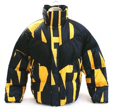 Men's Nike Sportswear Black & Yellow Ochre Down Fill Insulated Puffer Jacket  Gender:       Men Brand:         Nike Style #:        928889-752 Style:           Full Zip Down Insulated Puffer Jacket Color:          Black/Yellow Ochre Fit:               Loose Fit Full Front 2-way Zipper  Storm Flap Over Zipper  (snaps at top and bottom of storm flap to hold in place Funnel Neck (2) Large Hand Warmer Pockets with Zip Closure Elastic in Cuffs Elastic at Bottom  Interior Left Vertical Zip Chest Pocke Nike Urban Track Jacket For Winter, Athleisure Long Sleeve Puffer Jacket For Streetwear, Athleisure Streetwear Puffer Jacket, Nike Track Jacket For Winter Sports, Nike Urban Outerwear For Winter Sports, Winter Sportswear Puffer Jacket For Streetwear, Sportswear Puffer Jacket For Streetwear, Athleisure Winter Sports Puffer Jacket, Nike Winter Sports Puffer Jacket