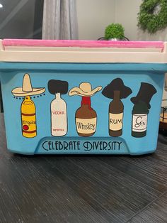 an ice chest with four different bottles on it and the words celebrate diversity