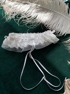 Luxurious lace bridal garter with a little bow and a cute flower button.  It's made from a layer of lovely soft organza, delicate scalloped lace and satin ribbons.  The garter comes on elastics so it doesn't slip off.  Can be worn for wedding or hen party or just as a lingerie accessory. Lace Garter With Knife, White Thigh Garter, Blue Wedding Garder, White Garter Belt Vintage, White Lace Garter, White Garters, Bridal Garter Lace, Blue Garter, Cute Pjs