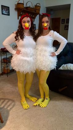 two women dressed in yellow and white are posing for the camera with their hands on their hipss