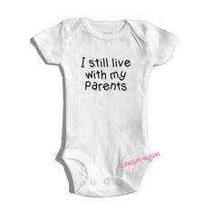 I Still Live with My Parents baby Onesie 100% Cotton Snap Infant One-Piece Bodysuit. Our Process: This Baby bodysuit is printed using high quality fabric vinyl not "iron on transfers", these will not crack or peel!! This is done in Black . If you would like another color, please convo us & we'll take care of you! You will receive tracking info when it leaves our studio. Thank you for shopping! IslandGirl Dezigns Customizable Fitted Playful Onesie, Fitted White Onesie With Graphic Print, Cute Fitted Graphic Print Bodysuit, Cute Fitted Bodysuit With Graphic Print, White Fitted Onesie With Graphic Print, Funny Cotton Fitted Onesie, Funny Customizable Fitted Onesie, Fitted White Onesie For Playtime, Customizable Fitted Onesie