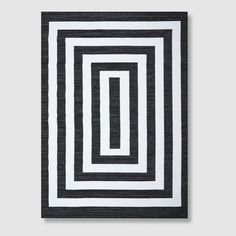 an abstract black and white painting with squares