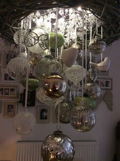 a chandelier filled with lots of glass balls