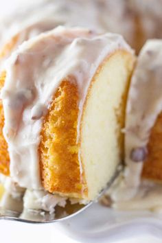 a close up of a cake on a plate with a fork