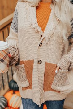 -Grab your pumpkin spice, and feel luxurious and nice! - Knit patchwork of various textures and colors - V-neck cut with fringe detail - Two button closures - Long sleeves with ribbed cuffs -Two functional front pockets - Straight hemline - Relaxed silhouette Measurements S-M : Bust 48", Hip 46", Length 26", Sleeve Length 20.5", Waist 48". M-L : Bust 50", Hip 48", Length 26.5", Sleeve Length 21", Waist 50". Knit Patchwork, Impressions Online Boutique, Iced Latte, Women Clothing Boutique, Online Womens Clothing, Distressed Jeans, High Waist Jeans, Pumpkin Spice, Boutique Clothing