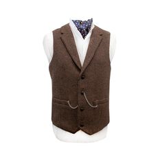 Burns Barleycorn Brown Waistcoat with Revere Complement your tweed jacket with one of our tweed waistcoats. Burns Barleycorn Brown Waistcoat with Revere tweed waistcoat is a timeless investment piece. This brown tweed fabric has been expertly handwoven and made into a true piece of Irish design. This waistcoat can be styled with casual suits, sports jackets, and with business wear Our Burns Barleycorn Brown Waistcoat with Revere tweed waistcoat is handmade from beautiful Barleycorn Brown tweed. Fall Tweed Single Breasted Vest, Fall Tweed Single-breasted Vest, Tweed Business Vest For Fall, Winter Tweed Three-piece Suit, Business Tweed Vest For Fall, Fall Business Tweed Vest, Single Breasted Tweed Vest For Workwear, Tweed Vest With Pockets For Tailoring, Winter Business Tweed Vest