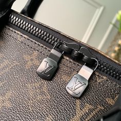 SHOP MORE LUXURY PRODUCTS HERE Description Louis Vuitton Keepall Bandouliere 50 Monogram Galaxy Canvas For Women, Travel Bags 19.7in/50cm LV An icon since the appearance in 1930, the Keepall embodies the spirit of modern travel. Light, supple and always ready for immediate departure, the bag lives up to its name: those adept at the art of packing can easily fit a week’s wardrobe into the generously sized (and cabin-friendly) Keepall 50. Shown here in classic Monogram Canvas, with a strap f Luxury Travel Bags With Logo Hardware, Luxury Travel Bag With Logo Hardware, Monogram Canvas Bag With Logo Hardware For Travel, Black Travel Bag With Lock, Rectangular Monogram Canvas Bag With Logo Hardware, Designer Travel Shoulder Bag With Lock, Designer Shoulder Bag With Lock For Travel, Designer Black Shoulder Bag With Lock, Rectangular Monogram Canvas Bag With Lock