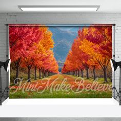 an image of fall trees with the words music make believe on it in front of a brick wall