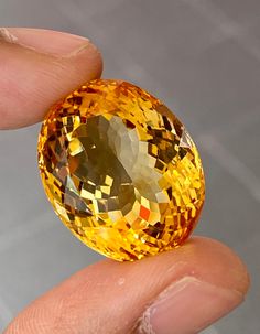 This gorgeous 100% Natural earth mined Citrine is a golden yellow Color Beauty. Born in Brazil. The Mixed fancy cut, Oval Shape, Flawless Clarity, gemstone is 39.82cts & measures 24 x 19.3 x 14.5 mm size, perfect for a cocktail ring or pendant setting. Luxury Yellow Gemstones For Wedding, Luxury Round Yellow Gemstones, Luxury Yellow Round Gemstones, Luxury Yellow Citrine Gemstones, Luxury Yellow Gemstones For Formal Occasion, Yellow Gemstones For Wedding, Luxury Gold Oval Gemstones, Luxury Yellow Gemstones For Anniversary, Oval Citrine Gemstones For Formal Events