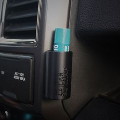 the interior of a car with an air freshener dispenser