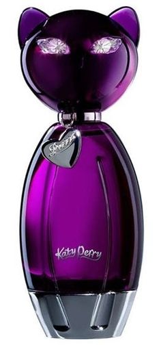 a purple cat shaped perfume bottle on a white background