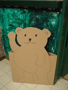 a cardboard cut out of a brown bear