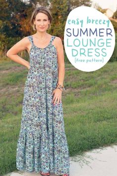 a woman standing in front of a sign that says easy breezy summer lounge dress