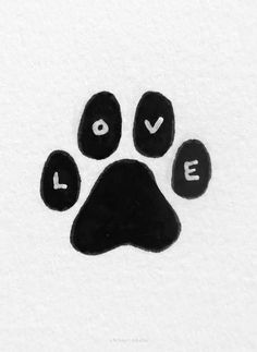 an animal's paw with the word love written on it