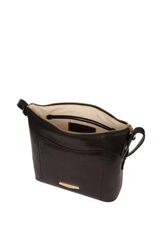 The 'Dee' shoulder bag from Pure Luxuries London is crafted from luxuriously smooth vegetable-tanned leather. A natural 100% cotton lined interior is secured by a zip-over top, complemented by two slip pockets ideal for a smartphone and keys. Additional storage space is provided by slip pockets on the front and rear of the bag. Comes with a detachable leather shoulder strap that is adjustable. Adorned with a simple and elegant Pure Luxuries gold plated metal plaque. Luxury London, Metal Plaque, Leather Cleaning, Bags Purses, Fit N Flare Dress, Boots For Sale, Jeans For Sale, Vegetable Tanned Leather, Leggings Shop