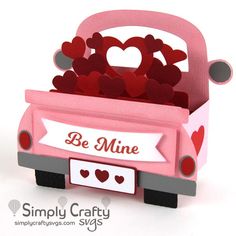 a valentine's day card with hearts in the back of a truck that says be mine